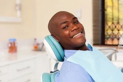 smiling man at dental office